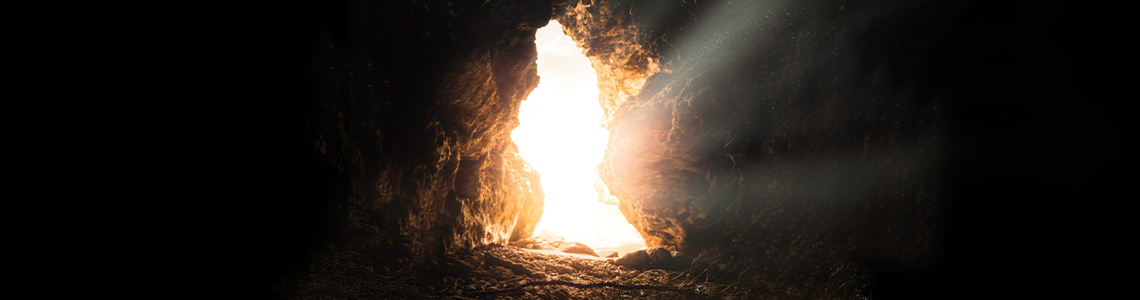 light coming thru a cave tunnel